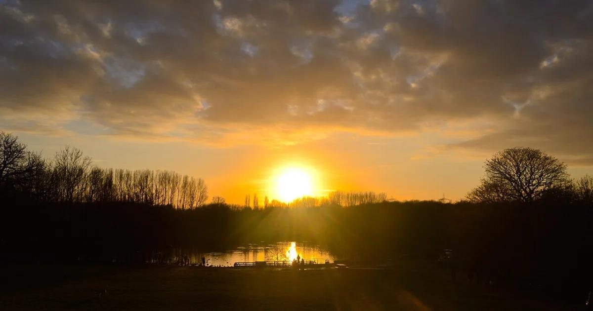 Winter sunset over the lake at Chorlton Water Park