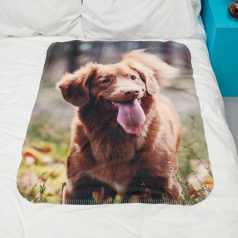 A personalised blanket printed with a dog photograph