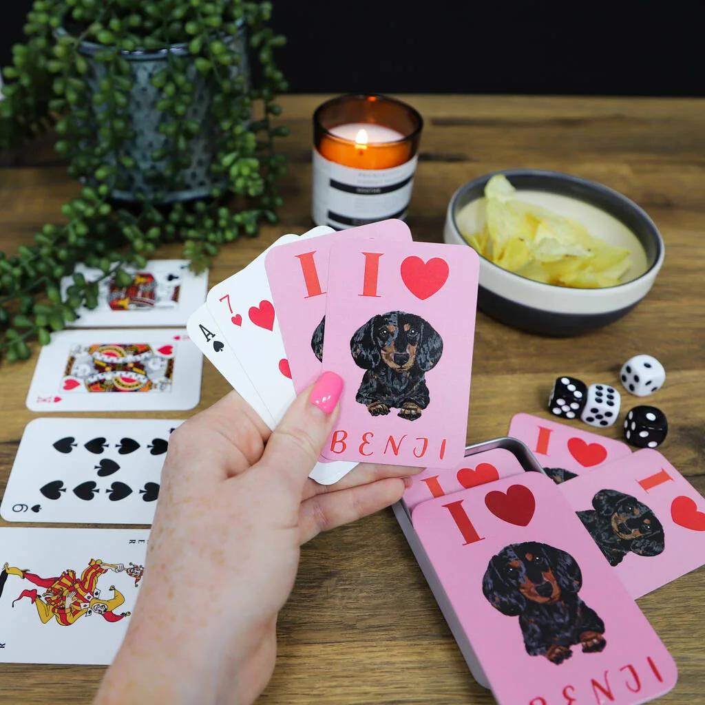 A deck of pink personalised pet playing cards