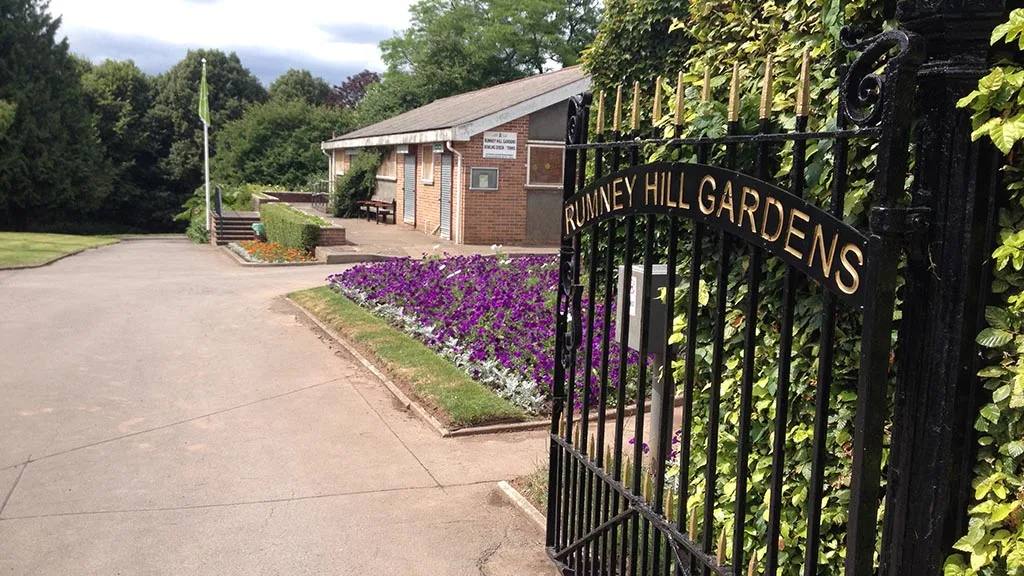 Rumney Hill Gardens entrance gate beside the park path and bowling pavilion