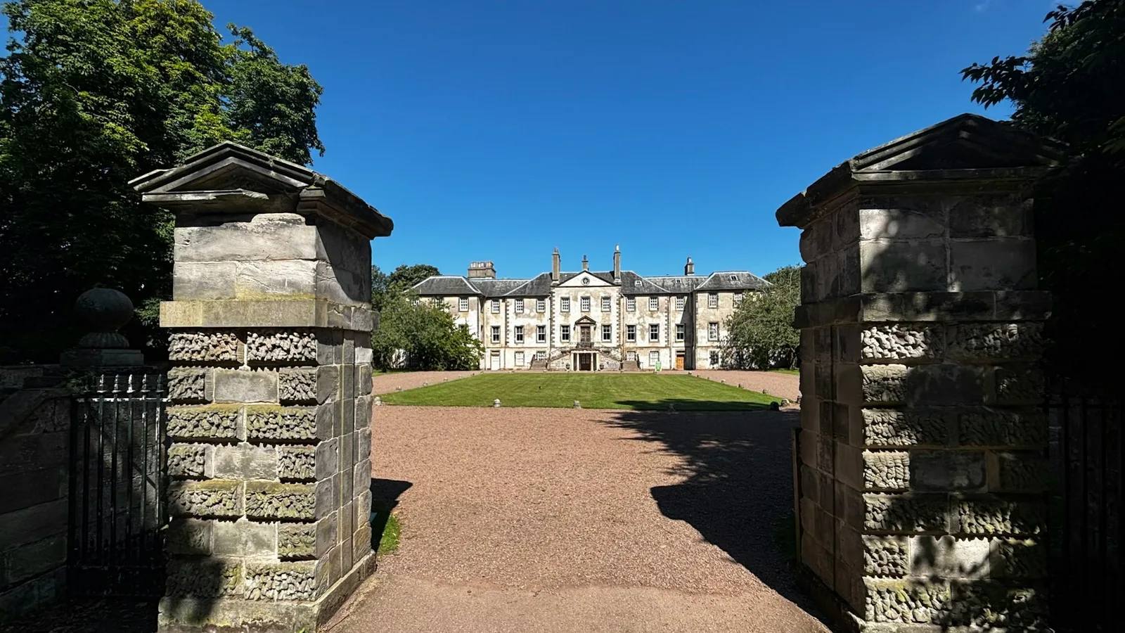 Newhailes House seen between its stone gateposts