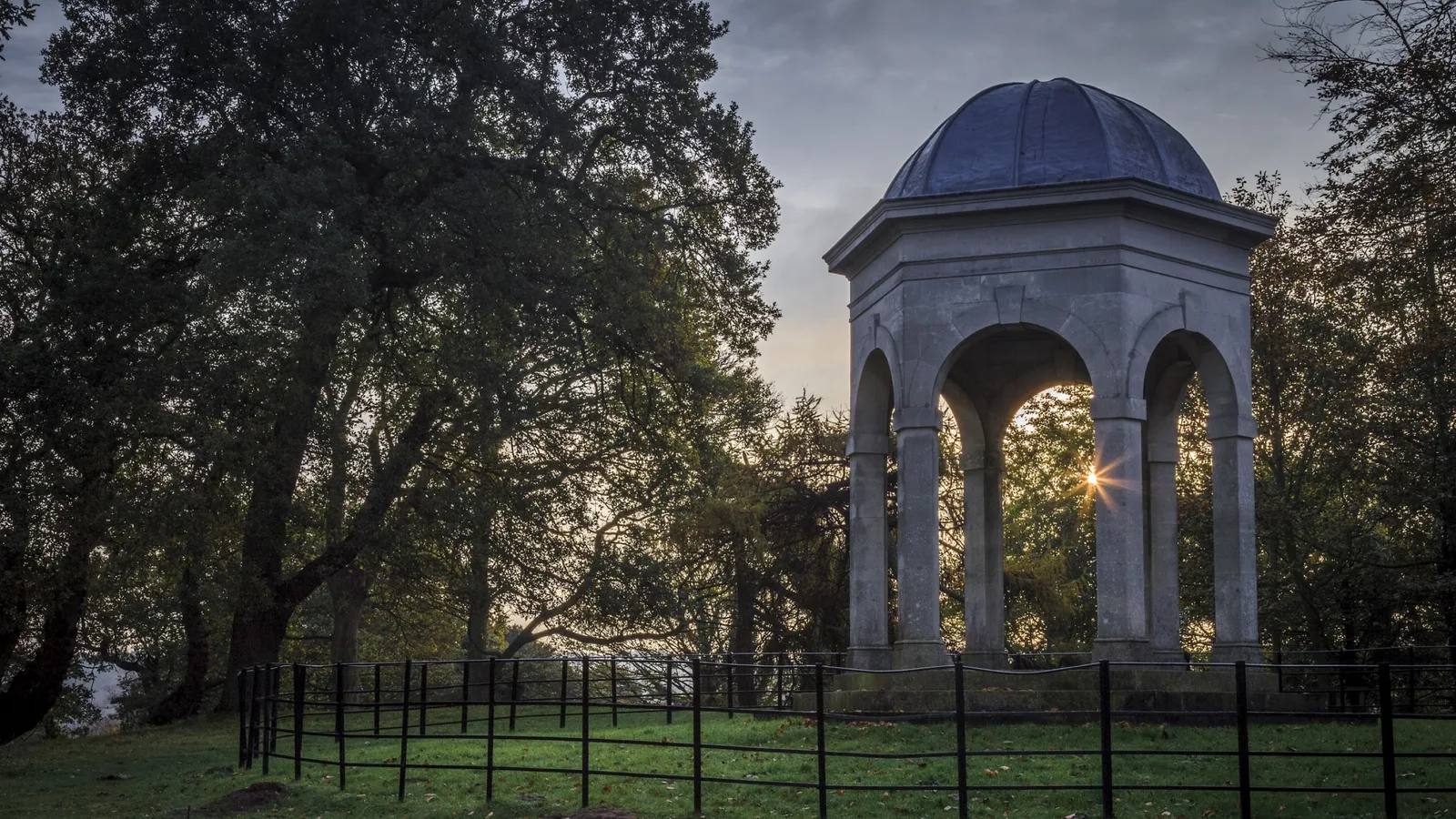 The Temple in Sheringham Park lit by a warm sunset