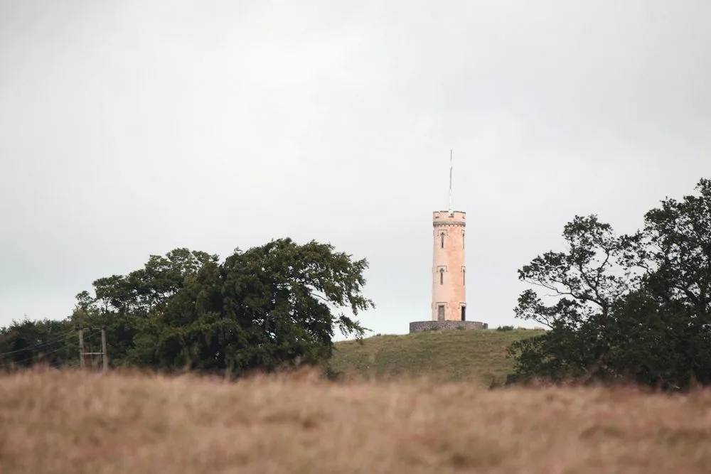 Binns Tower standing on a grassy hill at House of the Binns