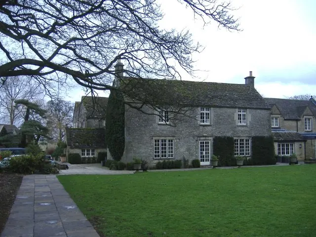 The stone frontage of Calcot Manor near Tetbury