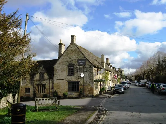 The Lamb Inn on Sheep Street in Burford beneath a bright sky