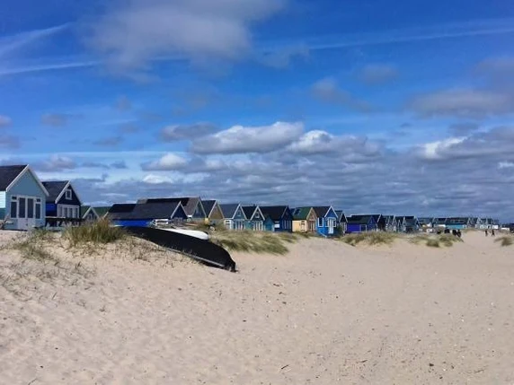 Sand and beach huts at Mudeford Sandbank