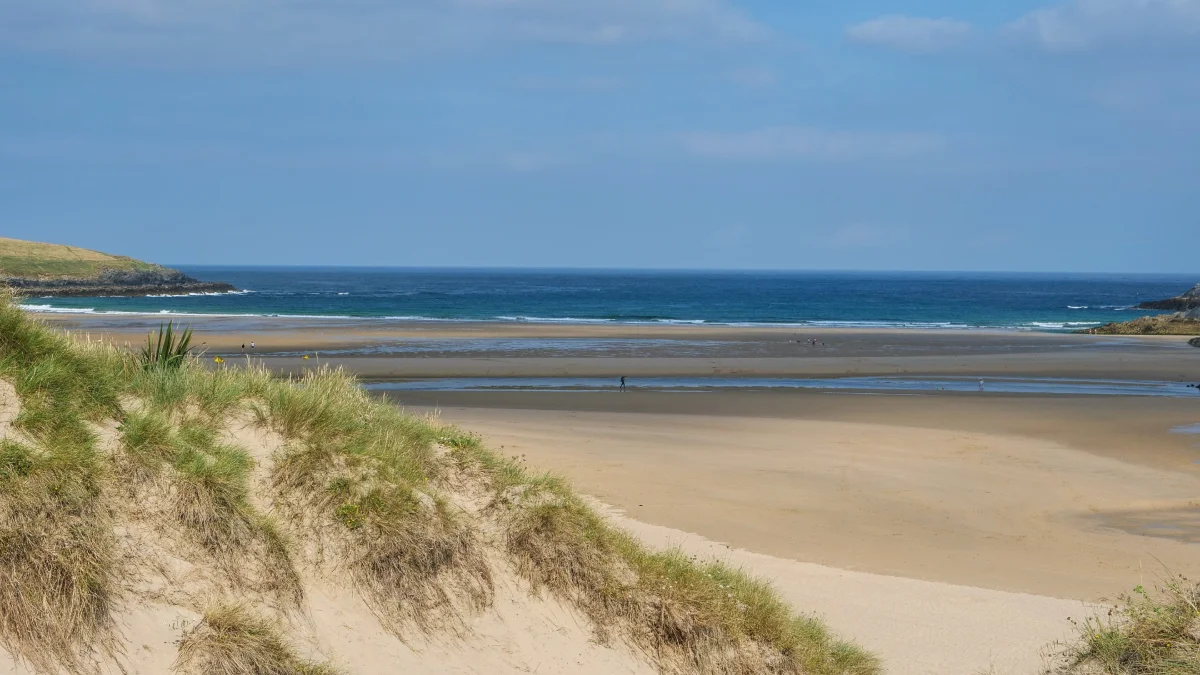 Sand dunes and Crantock Beach in Cornwall.