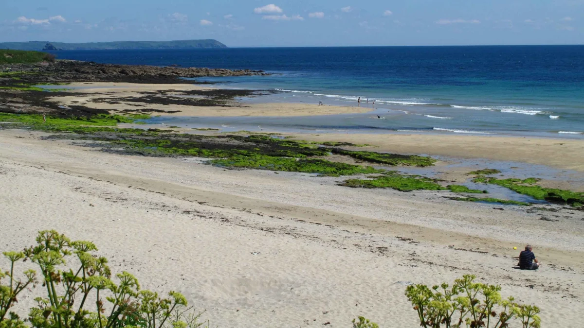 Visitors at Towan Beach, Porth on the Roseland, Cornwall.