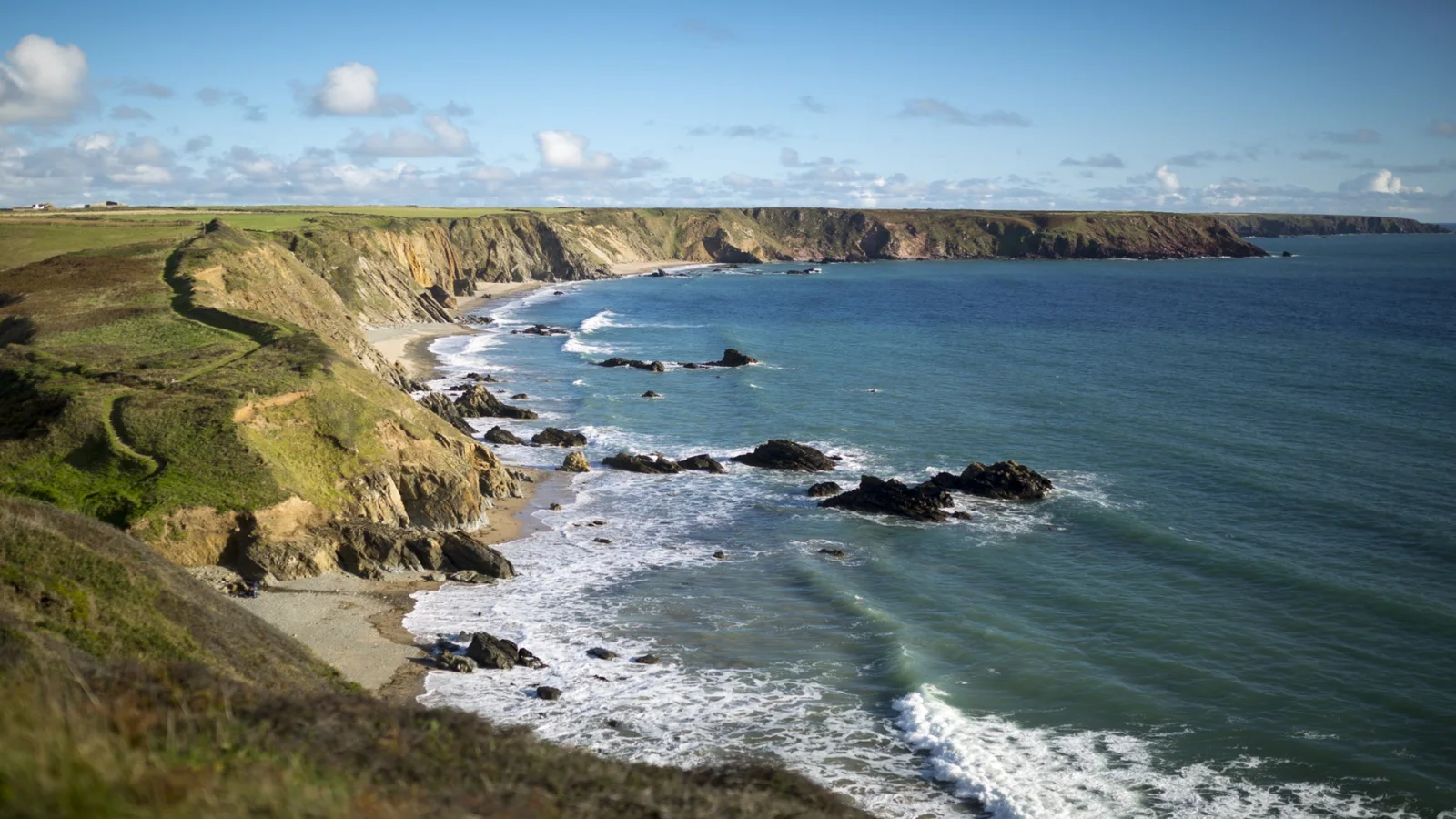 Marloes Sands and its rocky coves seen from the clifftop