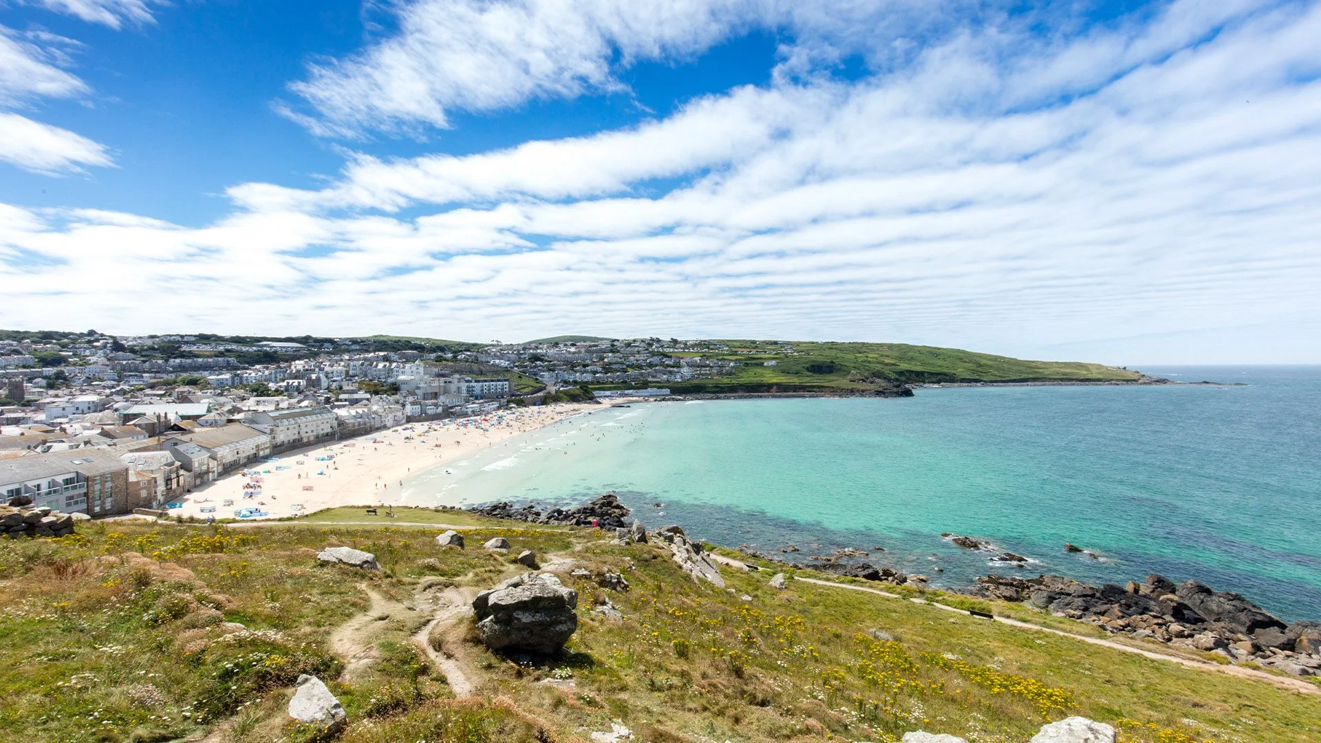 Porthmeor Beach and the St Ives waterfront.