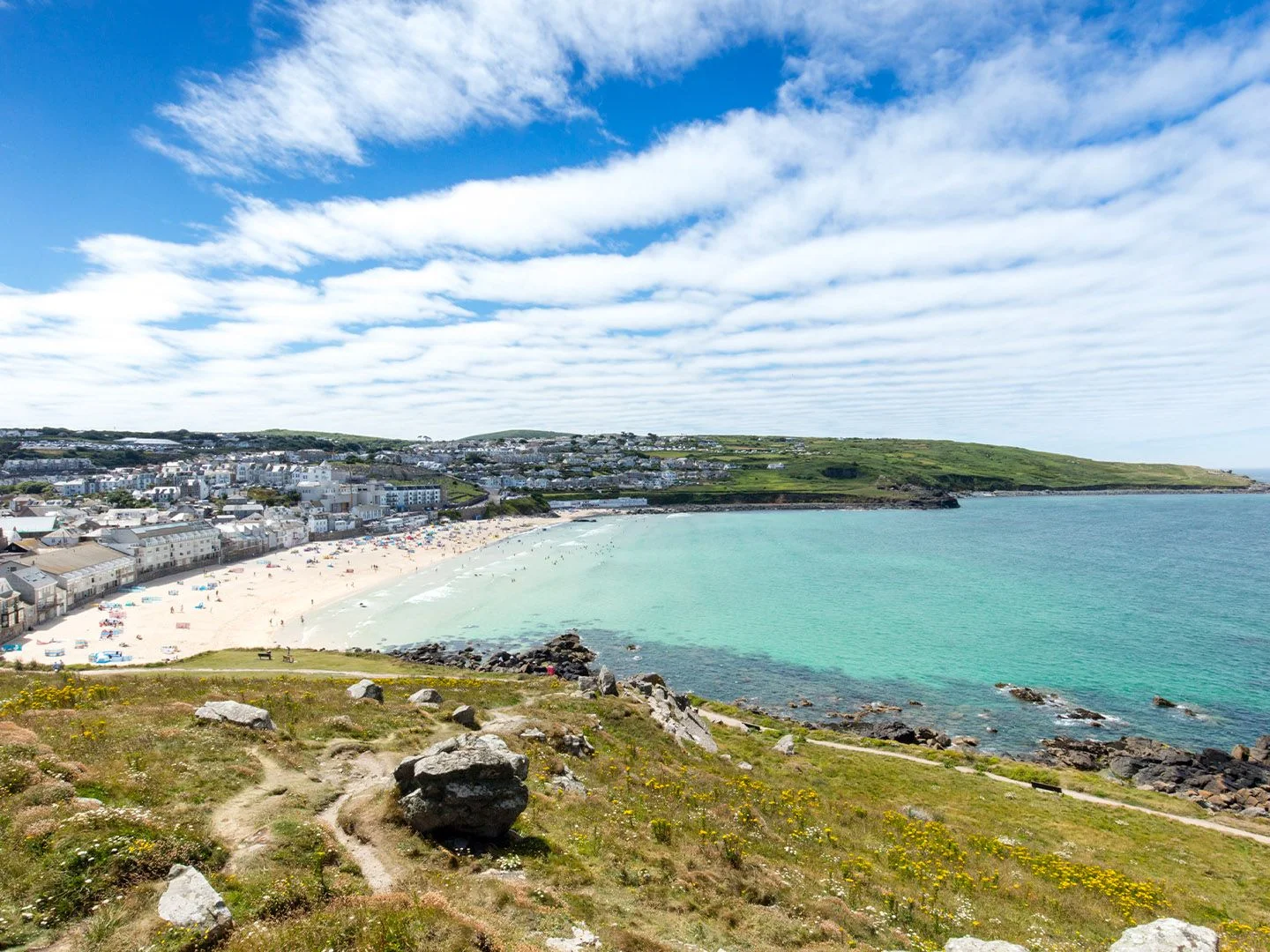 Porthmeor Beach and the St Ives waterfront.