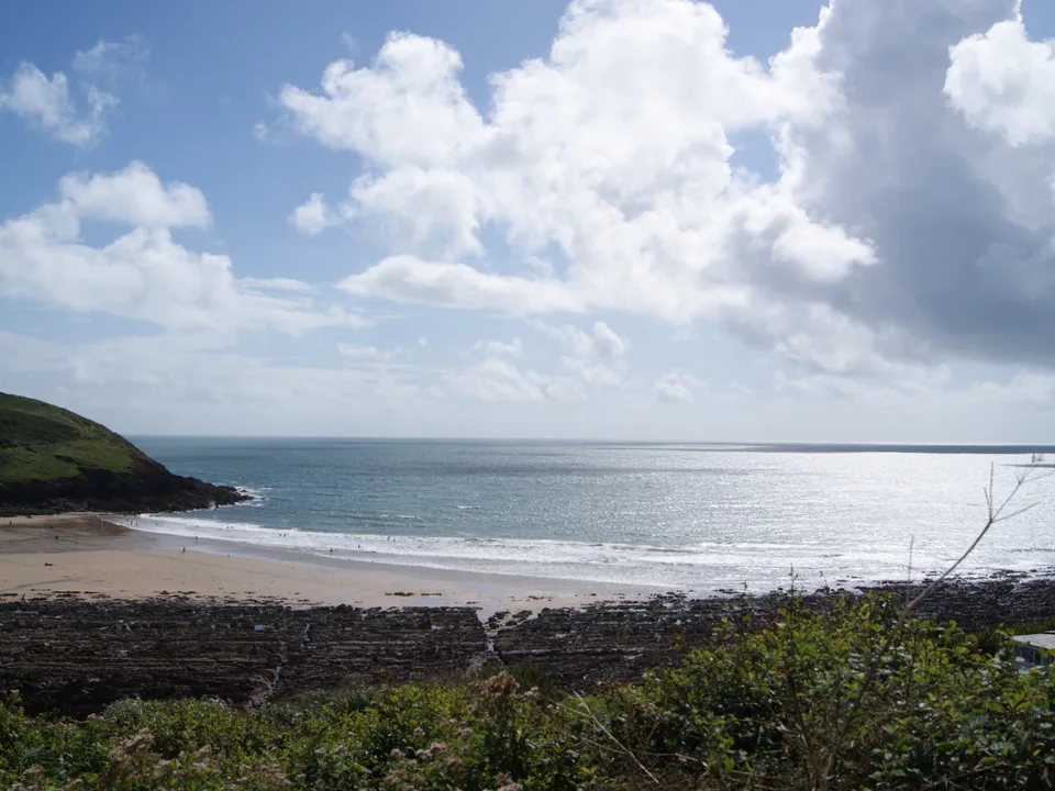 Sand and the shore at Manorbier Beach