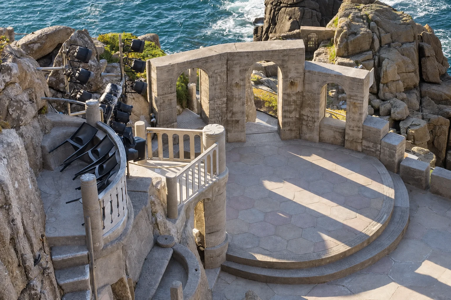 The stone stage of the Minack Theatre above the sea