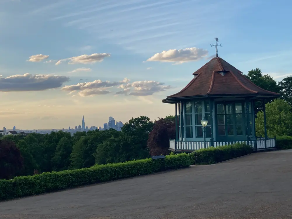 The Horniman Gardens bandstand with the London skyline beyond