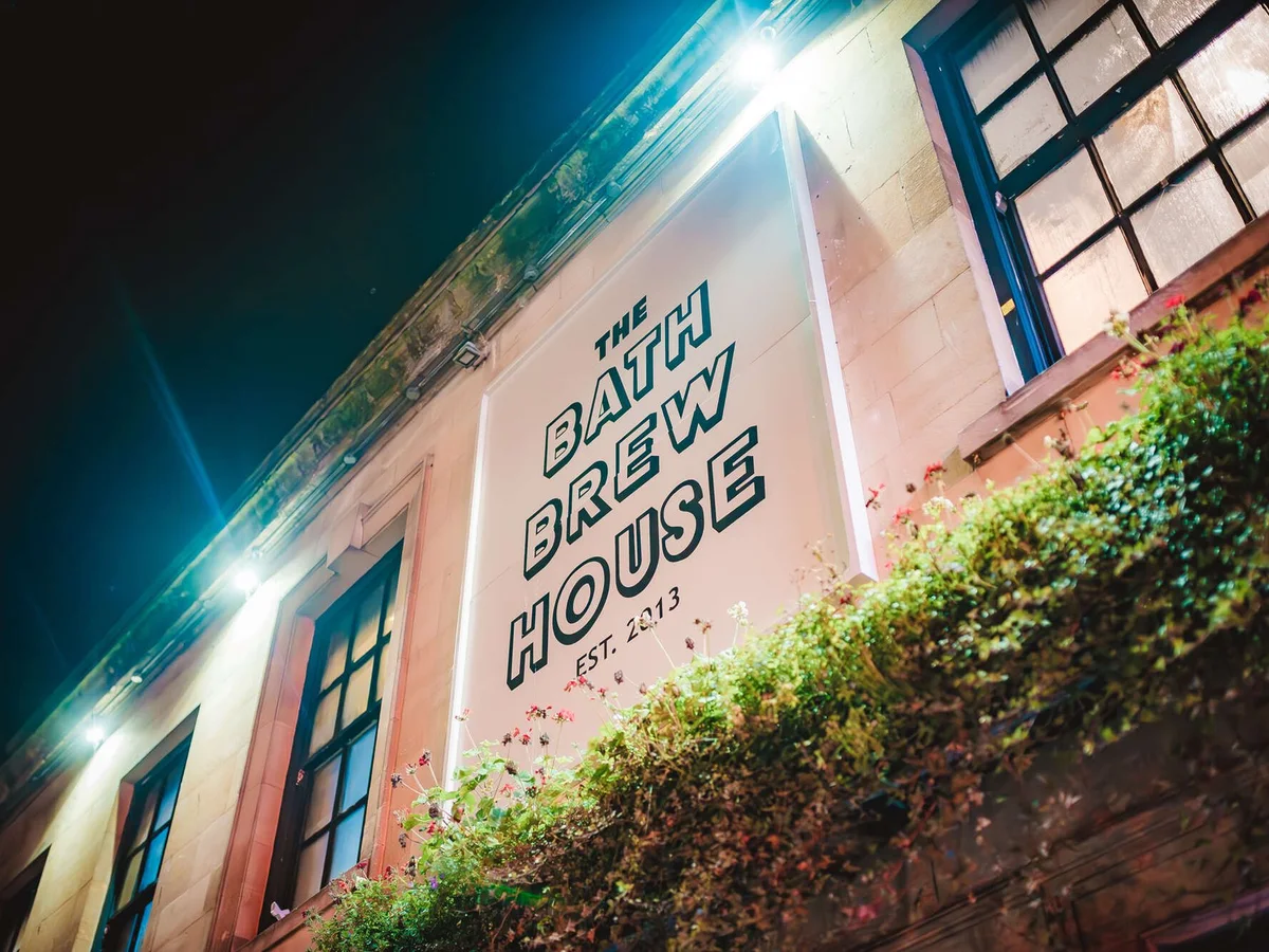 Illuminated Bath Brew House frontage at night