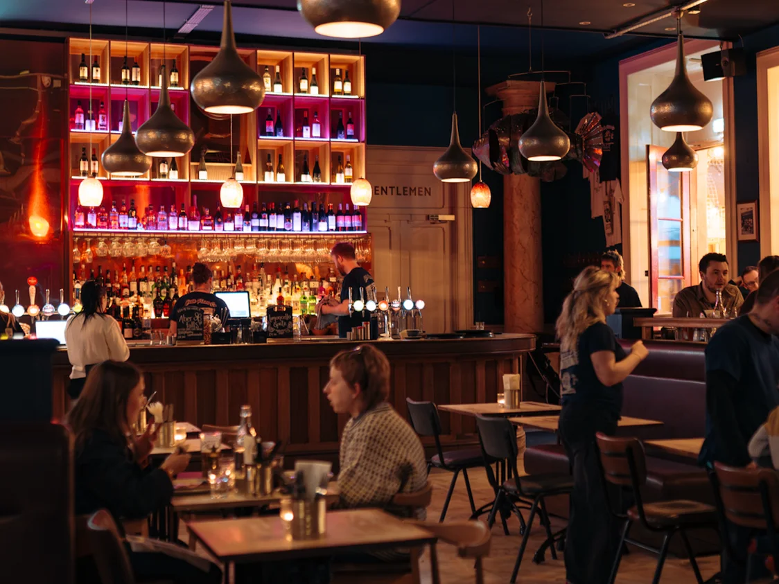 Diners and bar inside Green Park Brasserie