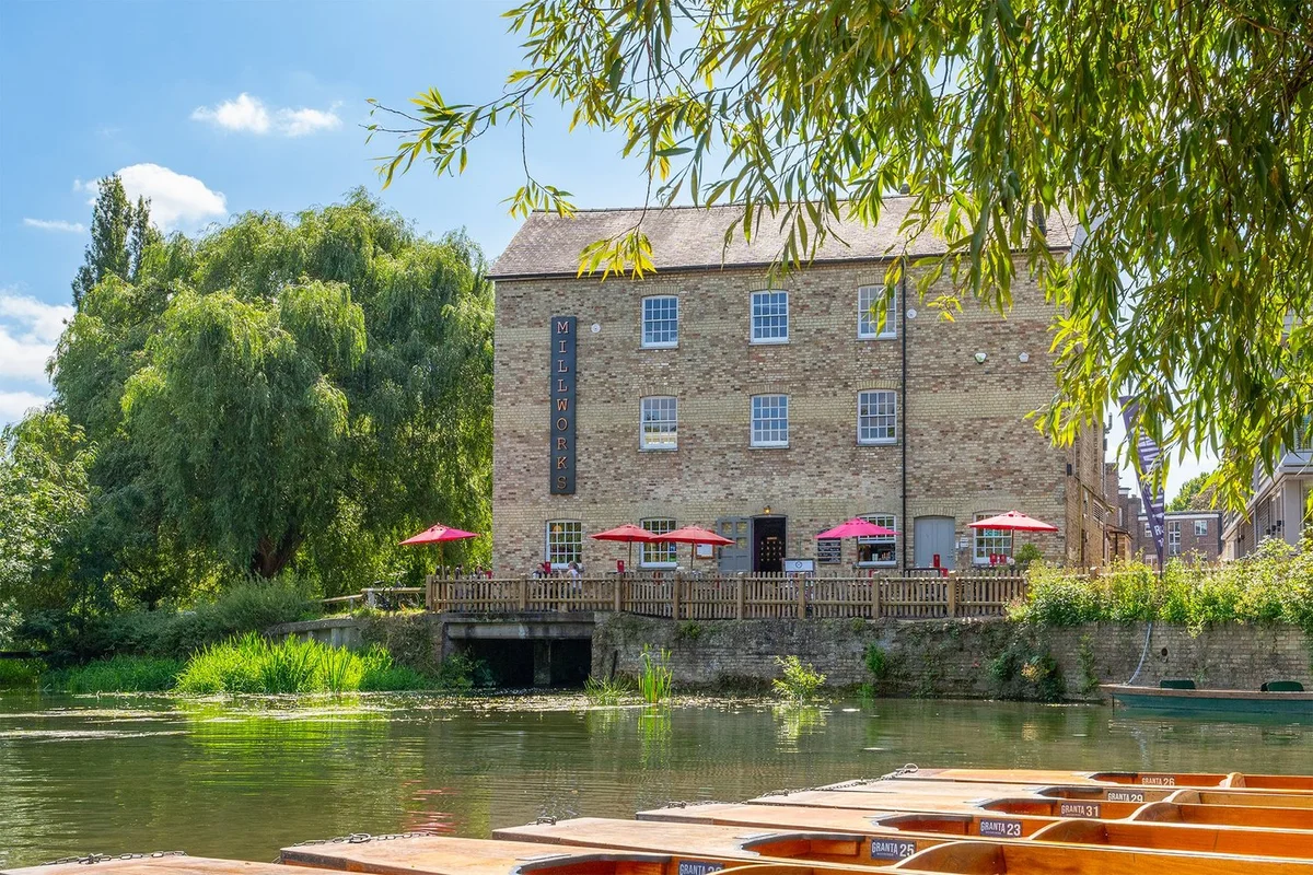 The Millworks restaurant and waterside terrace across Mill Pond in Cambridge