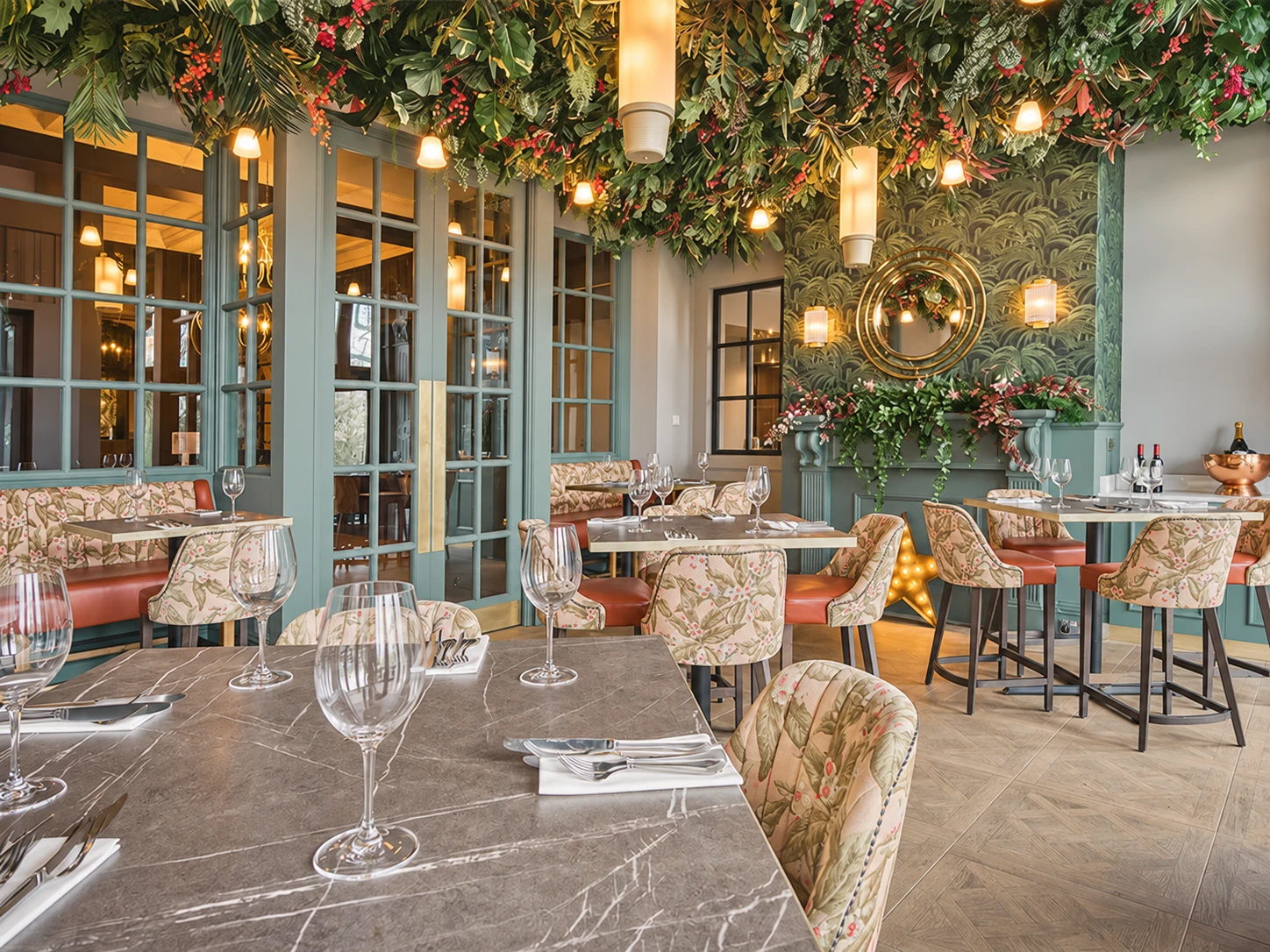 Dining tables in the botanical interior at The Pickled Sprout, Harrogate.