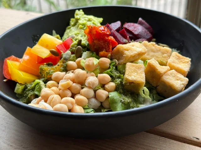 A colourful vegetable and chickpea bowl at Three Cottages Cafe.