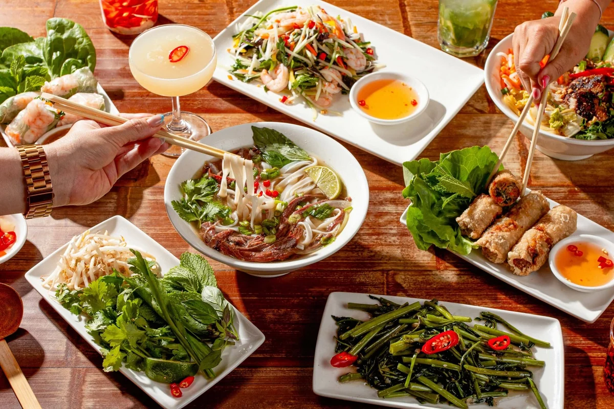 Sharing spread of Pho dishes